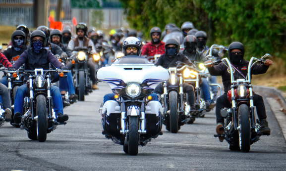 On the road again: Parampreet Singh Rajput (centre) leads the Sikh Motorcycle Club Australia on Sunday.