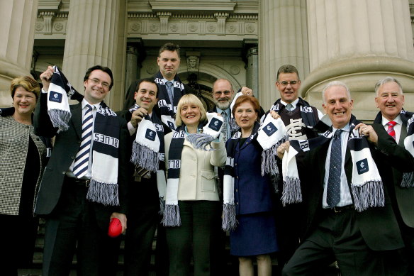 Martin Pakula (third from left), a Blues’ tragic, with fellow parliamentarians (L-R) Donna Petrovich, Michael O’Brien, Justin Madden, Jan Kronberg, Peter Crisp, Jeanette Powell, Peter Hall, Martin Dixon and Ken Smith on the steps of Parliament in 2007. 