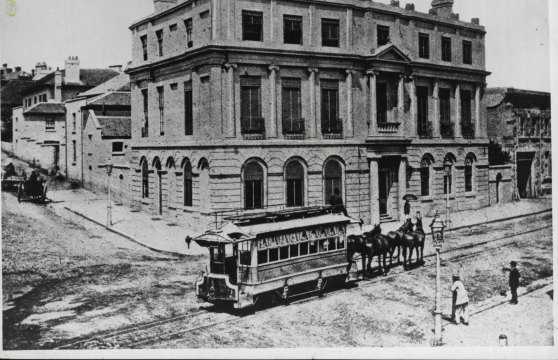 Sydney’s horse-drawn tram that opened before Christmas in 1861, seen here passing the Pitt and Hunter Streets corner, in about  1862.