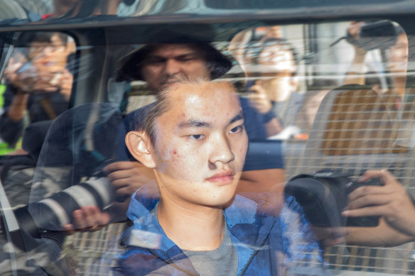 Murder suspect Chan Tong-kai inside a vehicle leaving Pik Uk Prison in Hong Kong.