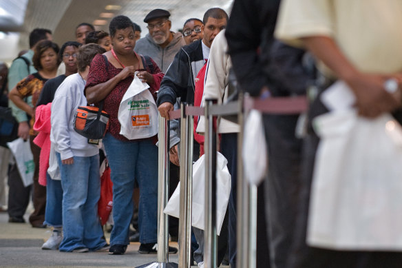 The jobless line up outside an employment guide job fair in Baltimore, in the US. 