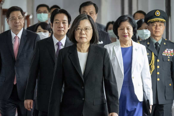 Taiwanese President Tsai Ing-wen, centre, walks ahead of Vice-President Lai Ching-te, left of her, as they attend an inauguration ceremony in Taipei.