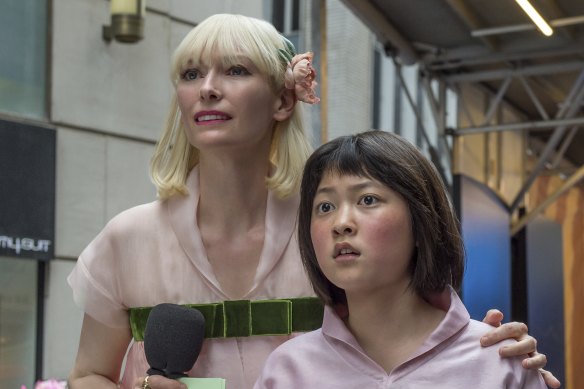 Tilda Swinton (left) with An Seo Hyun in the film Okja.