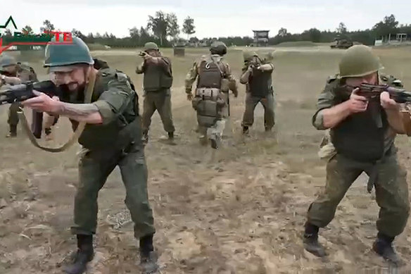 Belarusian soldiers attend a training by mercenary fighters from Wagner private military company near Tsel village, about 90 kilometres southeast of Minsk, Belarus. 