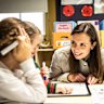 NSW Minister for Finance Courtney Houssos interacting with Year 1 students at Maroubra Junction Public School. She says statewide phonics testing with that age group has shown encouraging results.