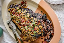 Overnight spiced lamb shoulder with an almond pomegranate crust.