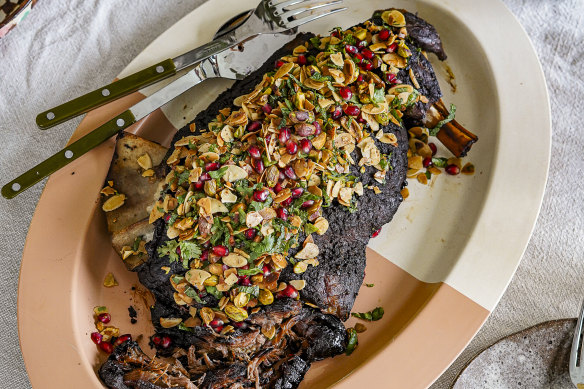 Overnight spiced lamb shoulder with an almond pomegranate crust. 