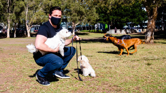 Christopher Jewell, with his Moodles Tiger and Lilly, wants a park designated as off-leash for smaller dogs.