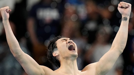China celebrates its win in the men’s medley relay.