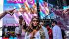 People dress up as “Barbie” to attend the “Barbie” movie in New York.