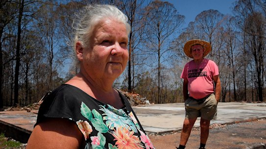Gwenda and Keith Duncan stand on the slab of their home, all that remains of the home they lost everything that was destroyed in the Hillville Fire that hit Rainbow Flat on the 8th of November, 2019. Gwenda and Keith were not insured and have not yet been visited by any government authority or non government organisation to assist them in their recovery following the fire that destroyed their home. Rainbow Flat, NSW. 21stJanuary, 2010.