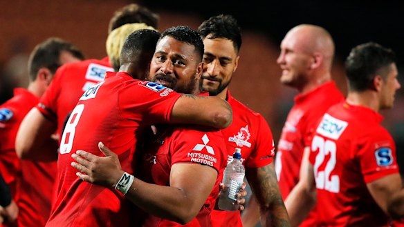 Off the mark: Sunwolves No. 8 Raboni Warren Vosayaco and prop Pauliasi Manu celebrate their breakthrough away victory.