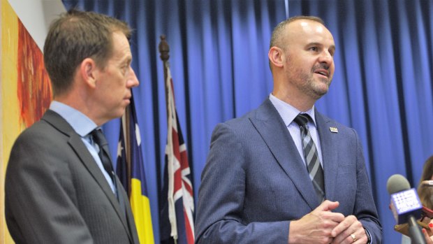 ACT Labor Chief Minister Andrew Barr and Greens Leader Shane Rattenbury discuss the parliamentary agreement on Thursday.