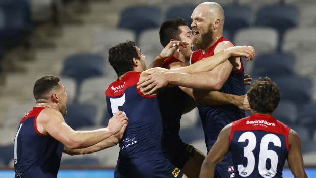 The Demons erupt after Max Gawn’s match-winning goal against Geelong.
