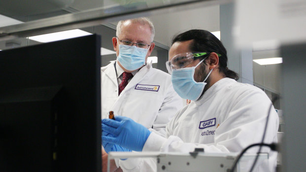 Prime Minister Scott Morrison meets with team member Gaby Atencio in the Analytical Laboratory at AstraZeneca in Sydney in August.