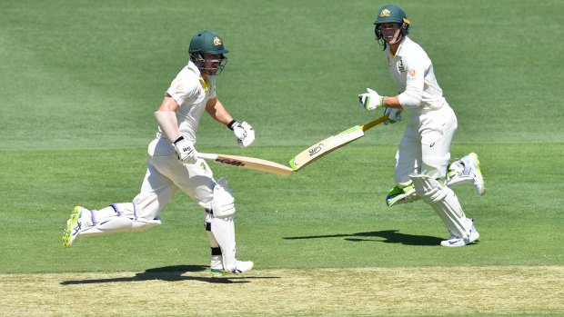 Partnership: Marnus Labuschagne, right,  and Travis Head during their long stint at the Gabba.