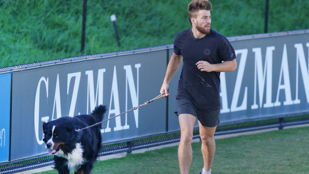 Keeping fit: Melbourne's Jack Viney trains with his dog Sebastian in anticipation of a season restart.