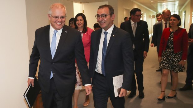 Prime Minister Scott  Morrison with state and territory leaders after the first in-person national cabinet meeting, in December.