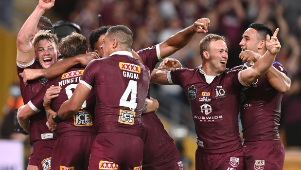 Queensland celebrate their series victory in game three last year.