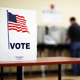 A voter casts his ballot in Georgia's 6th Congressional District special election in Sandy Springs.