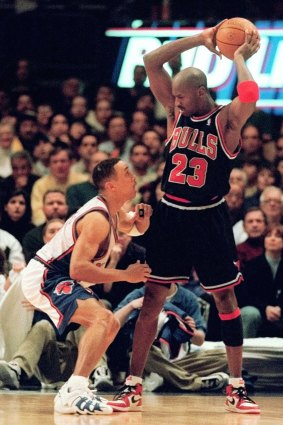 Chicago legend Michael Jordan with New York's John Starks at Madison Square Garden in 1998.