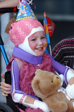 Sophie Delezio leaves the Children's Hospital Westmead in June, 2004. 
