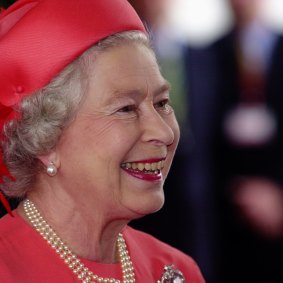 The Queen wore bright pink for a visit to Queensland in 2002.