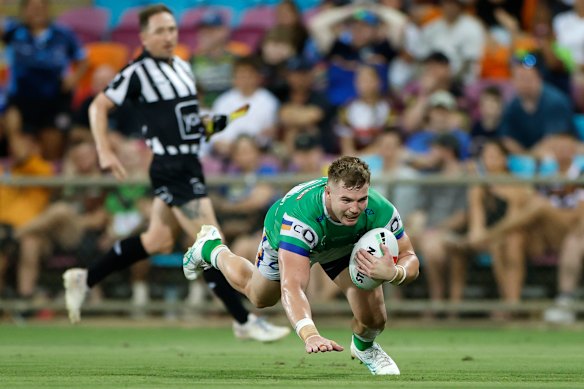 Ethan Strange of the Raiders scores a try. 
