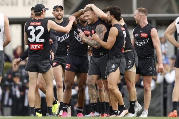 The Magpies share a laugh at training on Wednesday ahead of their preliminary final against GWS on Friday night.