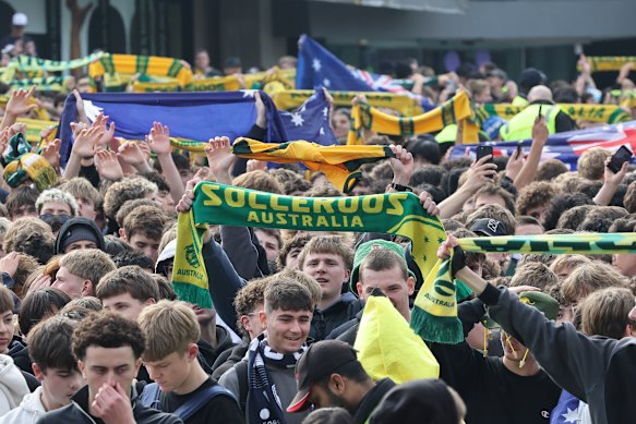 Socceroos fans queued early to get into the World Cup watch party at Federation Square.