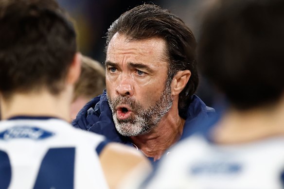 Chris Scott addresses his players during the thriller against the Blues.
