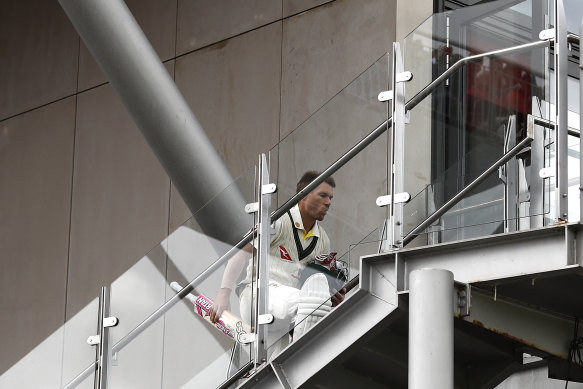 A dejected David Warner after being dismissed by Stuart Broad on day one of the Old Trafford Test four years ago.