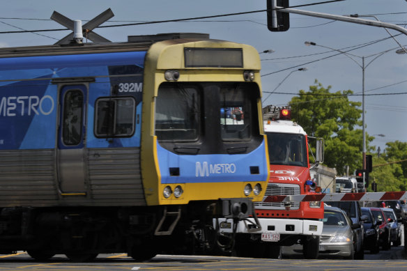 A fire truck at the now-removed Clayton Road level crossing.