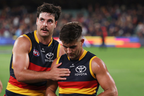 Crows Darcy Fogarty and Josh Rachele (right) after the loss to Essendon.