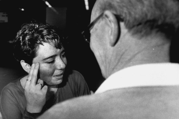 An emotional Joanne Mifsud, 15, greets her grandfather at Sydney Airport on August 19, 1990. 
