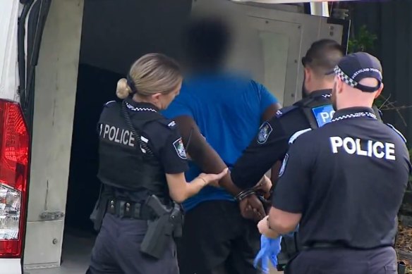 Police arrest a man at Jarvis Street in Stafford Heights.