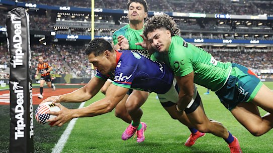 LAS VEGAS, NEVADA - MARCH 01: Roger Tuivasa-Sheck of the Warriors scores a try during the round one NRL match between the Canberra Raiders and the New Zealand Warriors at Allegiant Stadium on March 01, 2025, in Las Vegas, Nevada. (Photo by Ezra Shaw/Getty Images)