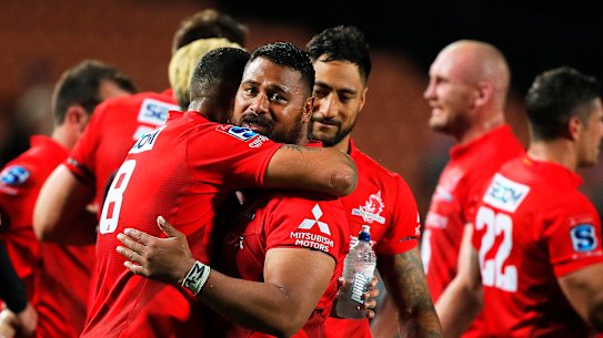 Off the mark: Sunwolves No. 8 Raboni Warren Vosayaco and prop Pauliasi Manu celebrate their breakthrough away victory.