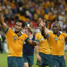 Rugby Union World Cup, Quarter Final.   Australia v Scotland at Suncorp Stadium, Brisbane.   Photo shows: Australians do lap after match, Lote Tuqiri and Wendell Sailor  8th November 2003.   FAIRFAX.   Pictures by CRAIG GOLDING.  SPECIAL 21619