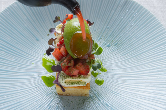 Almond cake topped with strawberries, a herb sorbet and strawberry juice is an ode to spring.