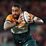 ADELAIDE, AUSTRALIA - JULY 12: Lukhan Salakaia-Loto of the AUNZ XV breaks from a tackle during the tour match between AUNZ XI and British & Irish Lions at Adelaide Oval on July 12, 2025 in Adelaide, Australia. (Photo by Cameron Spencer/Getty Images)