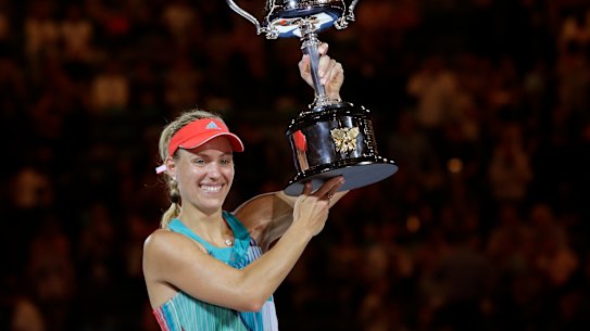 Angelique Kerber holding the trophy after winning the 2016 Australian Open.