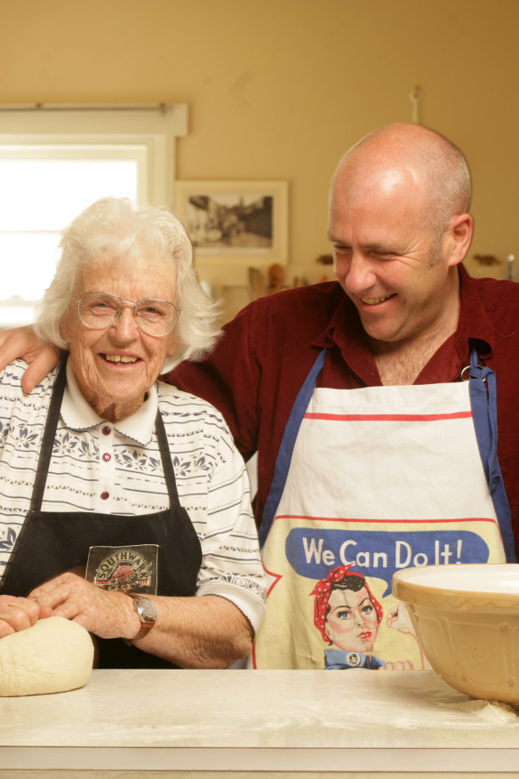 Richard Flanagan in the kitchen
with his mother, Helen, in 2005. “Making bread was my mother’s way back to her past,” he says.