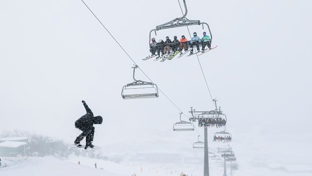 Skiers and snowboarders at Front Valley at Perisher Resort.