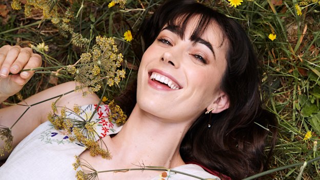 Geraldine wears Romance Was
Born dress, Holly Ryan earrings.