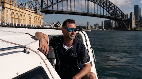 Tim Lackey on his boat named Alila in the Sydney Harbour.