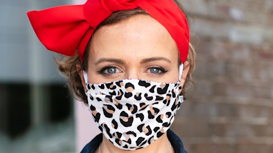 Milliner Chantelle Ford in one of her face masks she has started making in response to the pandemic.