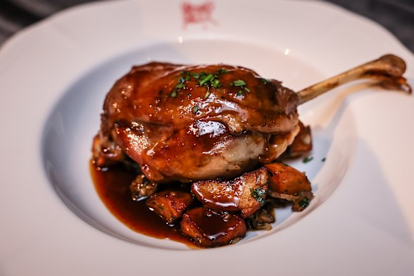  Confit duck leg with potatoes salardaise.