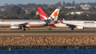 Qantas says it is not hoarding slots at Sydney.