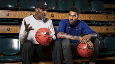 New 76ers player Jonah Bolden with his NBL legend father Bruce Bolden.
